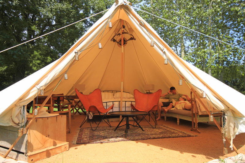 out of africa inspired tent interior glamping experience